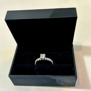 1 carat beautiful cushion cut never worn engagement ring.